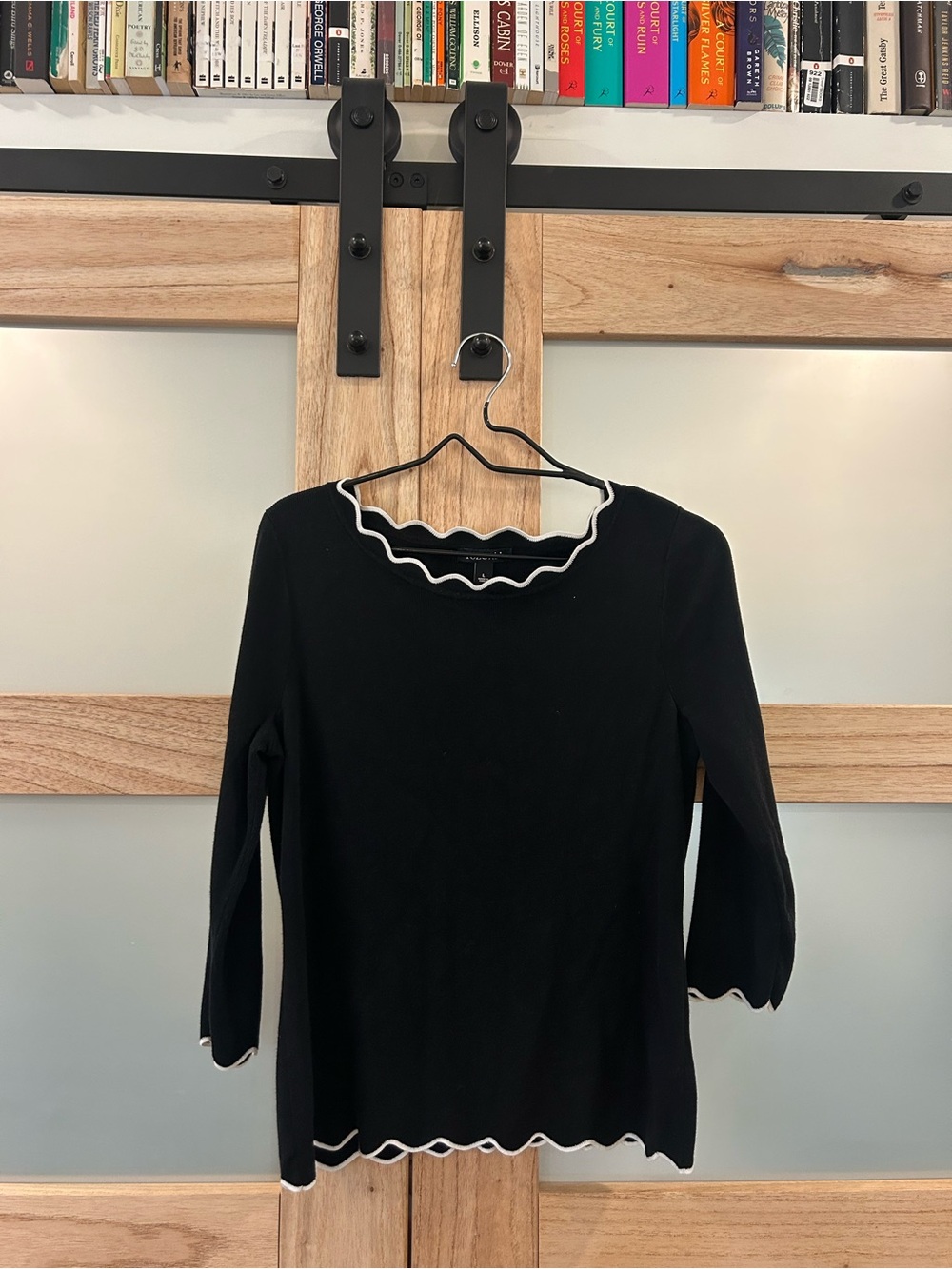 Black shirt with white scalloped hem